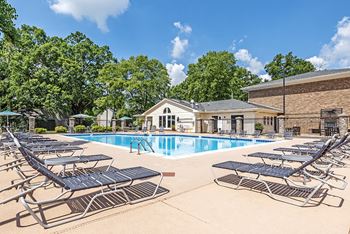 Poolside Sundeck With Relaxing Chairs at Canter Chase Apartments, Louisville, KY, 40242